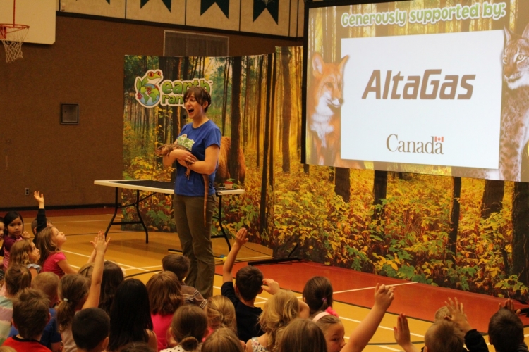 Travelling with four animal friends, Earth Rangers staff teach a group of students about bio diversity programing